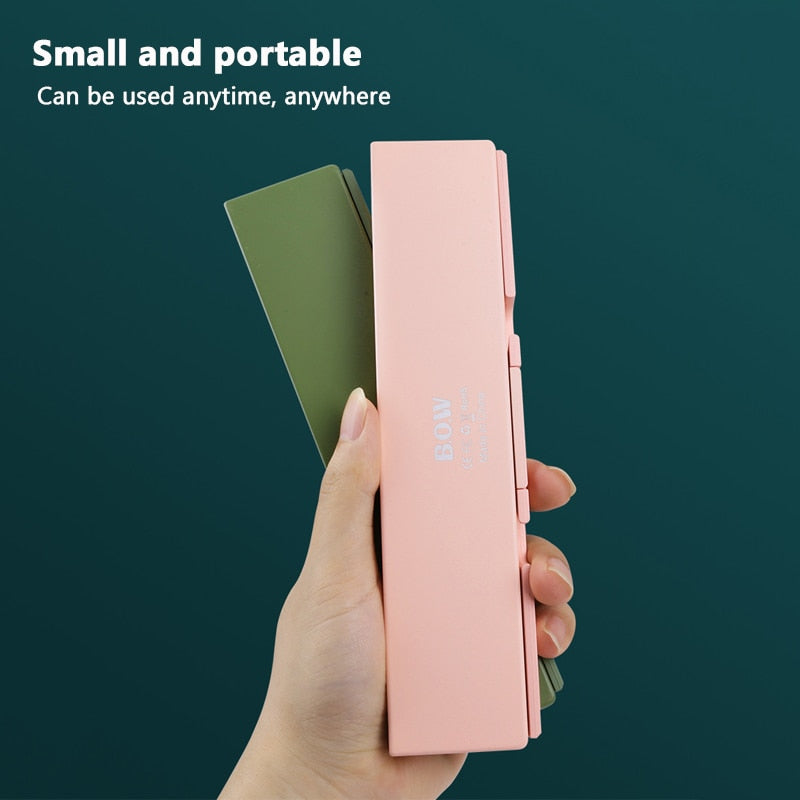 Portable Bluetooth Keyboard - Compact, Foldable, Rechargeable & Compatible with All Devices